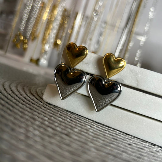 Two tone hearts earrings