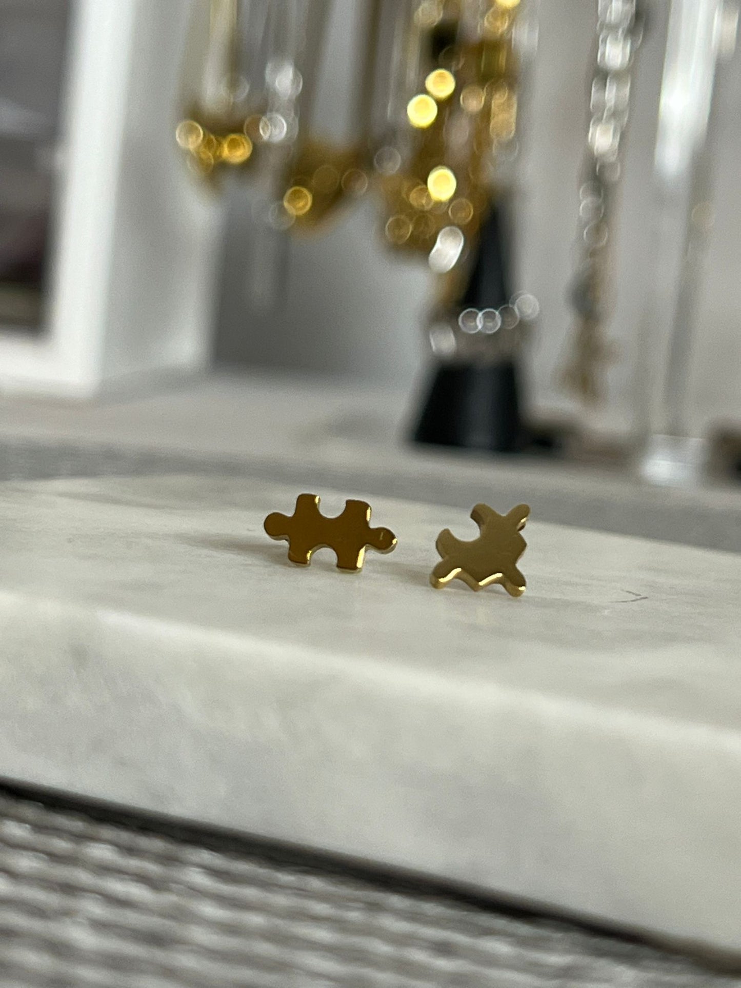 Puzzle pieces stud earrings